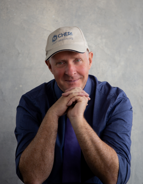 Mike Halsall wearing a CHERI cap